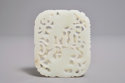 A Chinese reticulated jade plaque with geese and lotus flowers, 19/20th C.