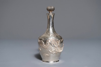 A Chinese silver liquor set on tray with applied dragon design, 19/20th C.