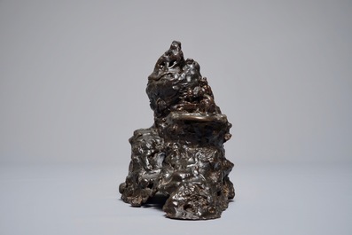 A Chinese bronze incense burner modelled as a mountain with qi-players, 18/19th C.