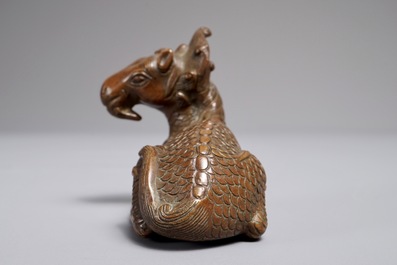 A Chinese bronze scroll or paper weight shaped as a longma, 18/19th C.