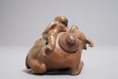 A Chinese bronze water dropper shaped as a boy on a buffalo, 18/19th C.