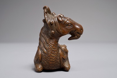 A Chinese bronze scroll or paper weight shaped as a longma, 18/19th C.