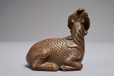 A Chinese bronze scroll or paper weight shaped as a longma, 18/19th C.