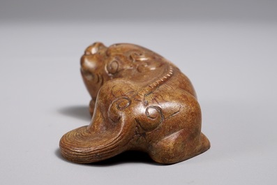 A Chinese bronze scroll or paper weight shaped as a Buddhist lion or Shishi, 18/19th C.