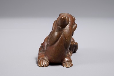 A Chinese bronze scroll or paper weight shaped as a chilong, 18/19th C.