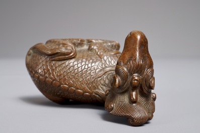 A Chinese bronze scroll or paper weight shaped as a longma, 18/19th C.
