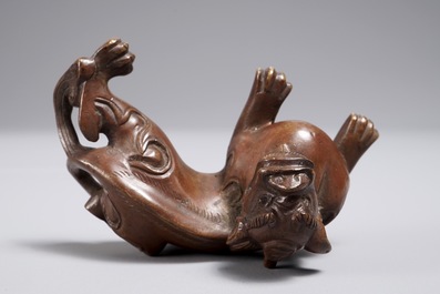 A Chinese bronze scroll or paper weight shaped as a chilong, 18/19th C.