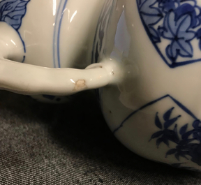 A Chinese blue and white elephant handle vase, Transitional period