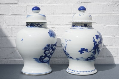 Two Chinese blue and white vases and covers with figures, 19th C.