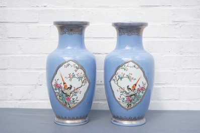 A pair of Chinese famille rose lavender-blue-ground vases, Qianlong mark, Republic, 20th C.