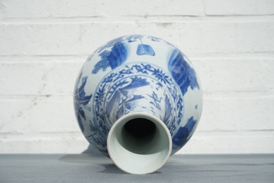 A Chinese blue and white bottle vase with figurative design around, Transitional period