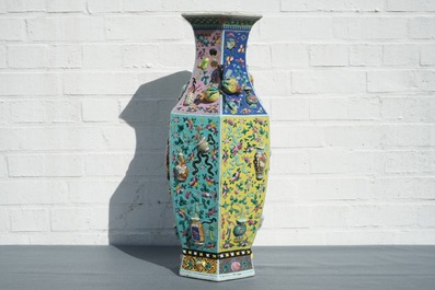 A hexagonal Chinese famille rose vase with applied design, 19th C.