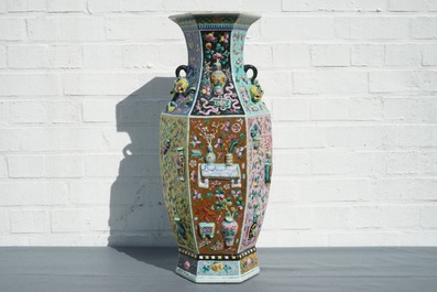 A hexagonal Chinese famille rose vase with applied design, 19th C.