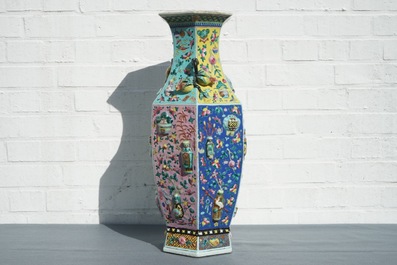 A hexagonal Chinese famille rose vase with applied design, 19th C.