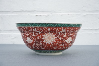 A Chinese coral-ground lotus scroll bowl, Jiaqing mark, 19/20th C.