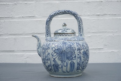 A Chinese blue and white kraak porcelain wine jug and cover with precious objects and flowers, Wanli