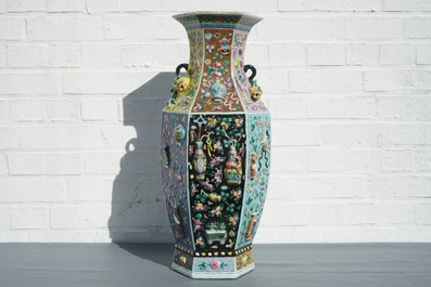 A hexagonal Chinese famille rose vase with applied design, 19th C.