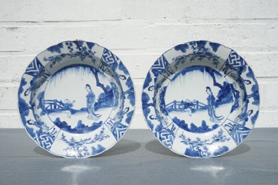 A pair of Chinese blue and white deep plates with Long Eliza and a boy, Kangxi