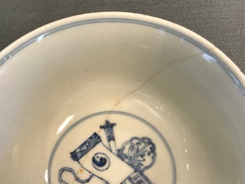 A Chinese blue and white bowl with butterflies and flowers, Yongzheng mark and of the period