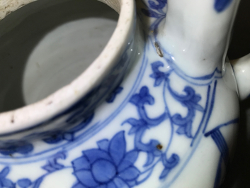 A Chinese blue and white wine jug and cover with fine design of birds and prunus branches, Transitional period