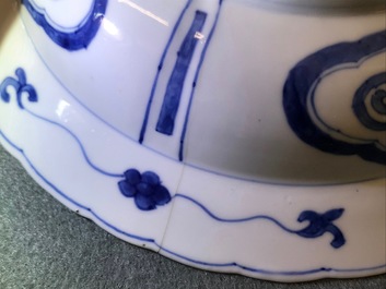 A pair of Chinese blue and white deep plates with Long Eliza and a boy, Kangxi