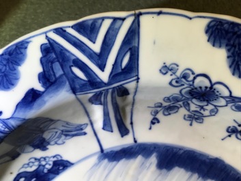 A pair of Chinese blue and white deep plates with Long Eliza and a boy, Kangxi