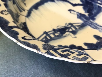 A pair of Chinese blue and white deep plates with Long Eliza and a boy, Kangxi