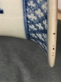 A pair of Chinese blue and white vases with ladies at a table, 19th C.