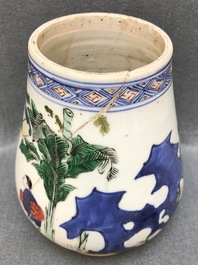 A Chinese wucai brush pot of tapering form with figural design, Transitional period