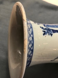 A pair of Chinese blue and white vases with ladies at a table, 19th C.