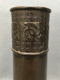 Een Chinese bronzen flesvormige vaas met reli&euml;fdecor, Yuan