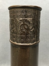 A Chinese bottle-shaped bronze vase with applied design, Yuan