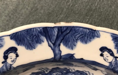 A pair of Chinese blue and white deep plates with Long Eliza and a boy, Kangxi