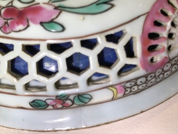 Une tasse et soucoupe en porcelaine de Chine famille rose ajour&eacute; et &agrave; double parois, Yongzheng