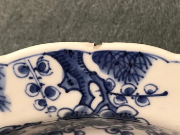 A pair of Chinese blue and white deep plates with Long Eliza and a boy, Kangxi