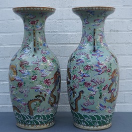 A pair of Chinese famille rose celadon-ground dragon vases, 19th C.