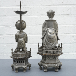 A Chinese pewter candlestick and a figure of a boy, 19/20th C.