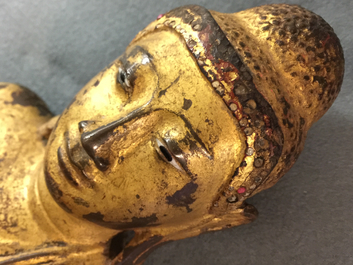 A large Burmese inlaid, gilt and lacquered bronze Mandalay-style Buddha, 19th C.