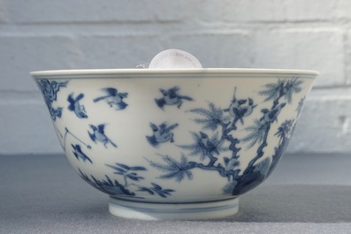 A Chinese blue and white bowl with birds among foliage, Kangxi mark and of the period