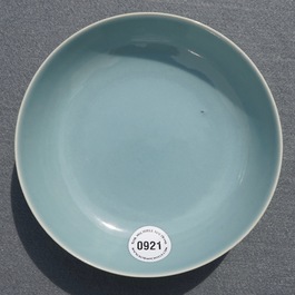 A monochrome Chinese clair-de-lune glazed saucer dish, Qianlong mark, 19/20th C.