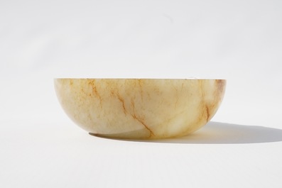 A Chinese russet jade bowl with triangular handle, 19/20th C.