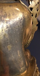 A Sino-Tibetan gilt bronze figure of Tsongkhapa, 17/18th C.