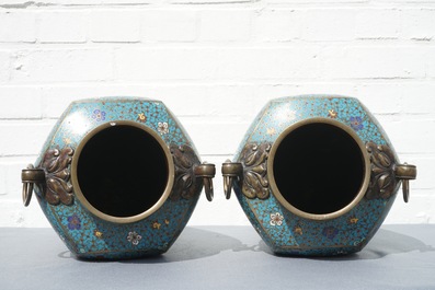 A pair of Chinese cloisonn&eacute; vases with floral design and ring handles, 19th C.