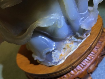 A Chinese carved agate figure of a lady and a vase on wooden stand, 19/20th C.