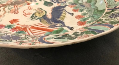 A large Chinese famille verte qilin and phoenix charger, Kangxi