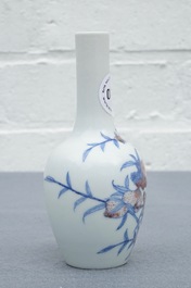 A Chinese blue and underglaze red 'sanduo' vase, Kangxi mark, 19/20th C.