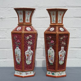 A pair of reticulated double-walled hexagonal Chinese famille rose vases, Yongzheng