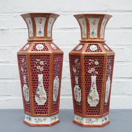 A pair of reticulated double-walled hexagonal Chinese famille rose vases, Yongzheng