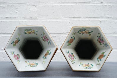 A pair of reticulated double-walled hexagonal Chinese famille rose vases, Yongzheng