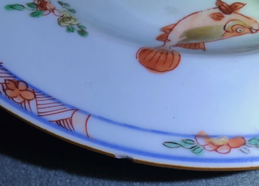 Three Chinese famille verte plates with carps and floral designs, Kangxi
